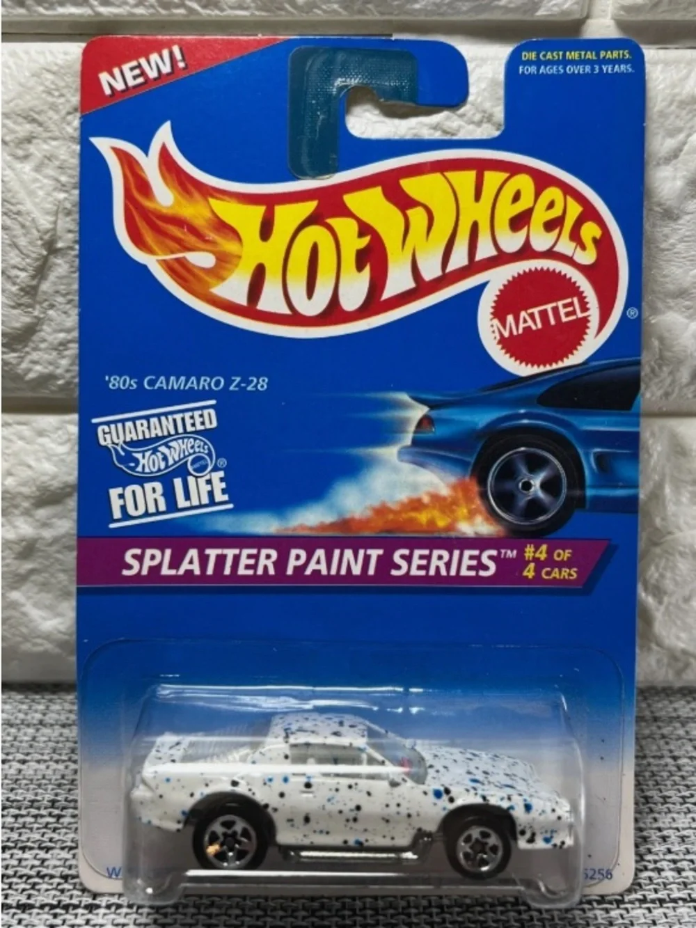 Mattel Splatter Paint Series White Toy Car with Blue and Black Accents